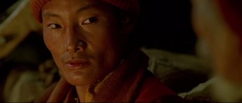 Movie still from “Himalaya” (1999), directed by Eric Valli – A person wearing a hat; Extreme Close Up shot, High angle