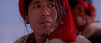 Movie still from “Himalaya” (1999), directed by Eric Valli – A person wearing a hat; Close Up shot, Low angle