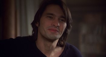 Movie still from “Unfaithful” (2002), directed by Adrian Lyne – A person with long brown hair; Close Up shot, High angle