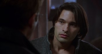 Movie still from “Unfaithful” (2002), directed by Adrian Lyne – A person with long hair; Close Up shot, Over the shoulder angle