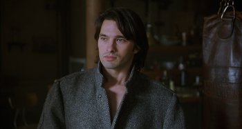 Movie still from “Unfaithful” (2002), directed by Adrian Lyne – A person with long hair; Close Up shot, Low angle