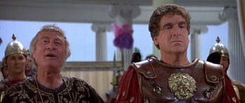 Movie still from “History of the World: Part I” (1981), directed by Mel Brooks – A man and a woman dressed in roman garb; Close Up shot, Over the shoulder angle