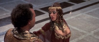 Movie still from “History of the World: Part I” (1981), directed by Mel Brooks – A man and a woman dressed in ancient egyptian clothing; Medium shot, Over the shoulder angle