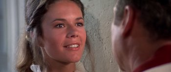 Movie still from “History of the World: Part I” (1981), directed by Mel Brooks – A person looking at a mirror; Close Up shot, Over the shoulder angle