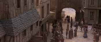 Movie still from “History of the World: Part I” (1981), directed by Mel Brooks – An overhead view of people walking down a street; Extreme Wide shot, High angle