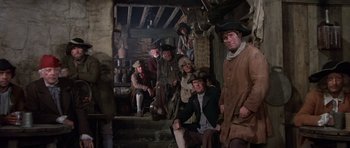 Movie still from “History of the World: Part I” (1981), directed by Mel Brooks – A group of people dressed in period clothing; Wide shot, High angle