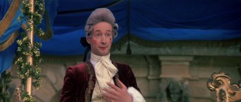 Movie still from “History of the World: Part I” (1981), directed by Mel Brooks – A man in a wig and a wig; Close Up shot, Over the shoulder angle