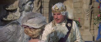 Movie still from “History of the World: Part I” (1981), directed by Mel Brooks – A man and a woman dressed in renaissance clothing; Close Up shot, Over the shoulder angle
