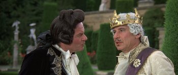 Movie still from “History of the World: Part I” (1981), directed by Mel Brooks – Two men dressed in period clothing and wearing crowns; Close Up shot, Over the shoulder angle