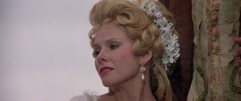 Movie still from “History of the World: Part I” (1981), directed by Mel Brooks – A person wearing a dress; Close Up shot, Low angle