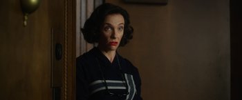 Movie still from “Hitchcock” (2012), directed by Sacha Gervasi – A woman in a black and white striped sweater; Close Up shot, Over the shoulder angle