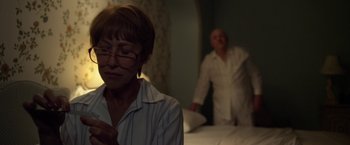 Movie still from “Hitchcock” (2012), directed by Sacha Gervasi – An older man and a woman in a bedroom; Medium shot, Over the shoulder angle