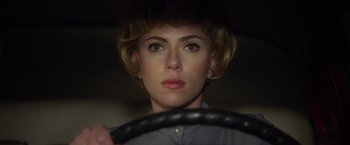 Movie still from “Hitchcock” (2012), directed by Sacha Gervasi – A person holding a steering wheel; Close Up shot, Over the shoulder angle