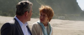 Movie still from “Hitchcock” (2012), directed by Sacha Gervasi – An older man and a woman talking to each other; Close Up shot, Over the shoulder angle