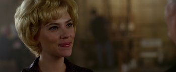 Movie still from “Hitchcock” (2012), directed by Sacha Gervasi – A person with blonde hair; Close Up shot, Over the shoulder angle