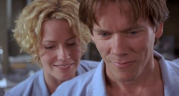 Movie still from “Hollow Man” (2000), directed by Paul Verhoeven – A man and a woman looking at each other; Close Up shot, Low angle