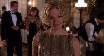 Movie still from “Hollow Man” (2000), directed by Paul Verhoeven – A person wearing a dress; Close Up shot, Over the shoulder angle