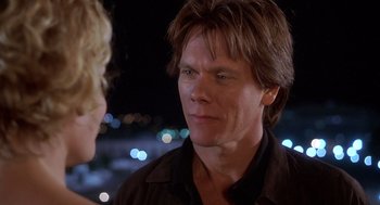 Movie still from “Hollow Man” (2000), directed by Paul Verhoeven – A man and a woman talking to each other; Close Up shot, Over the shoulder angle