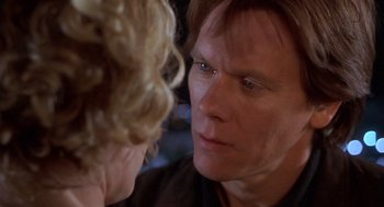 Movie still from “Hollow Man” (2000), directed by Paul Verhoeven – A man and a woman face to face in front of each other; Close Up shot, Over the shoulder angle