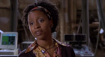 Movie still from “Hollow Man” (2000), directed by Paul Verhoeven – A person wearing a shirt; Close Up shot, Low angle