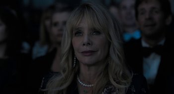 Movie still from “Holy Lands” (2017), directed by Amanda Sthers – A person wearing a necklace; Close Up shot, Low angle