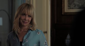 Movie still from “Holy Lands” (2017), directed by Amanda Sthers – A person wearing a blue shirt; Close Up shot, Over the shoulder angle