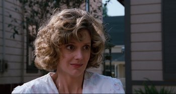 Movie still from “Honey, I Shrunk the Kids” (1989), directed by Joe Johnston – A person with curly hair; Close Up shot, Low angle