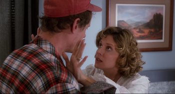 Movie still from “Honey, I Shrunk the Kids” (1989), directed by Joe Johnston – A man and a woman talking to each other; Medium shot, Over the shoulder angle