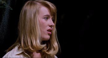 Movie still from “Honey, I Shrunk the Kids” (1989), directed by Joe Johnston – A woman with long blonde hair looking to her left; Close Up shot, Low angle