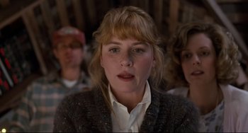 Movie still from “Honey, I Shrunk the Kids” (1989), directed by Joe Johnston – A person wearing a sweater; Close Up shot, Low angle