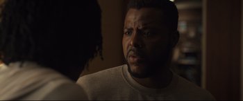 Movie still from “Us” (2019), directed by Jordan Peele – A person talking to another person; Close Up shot, Over the shoulder angle