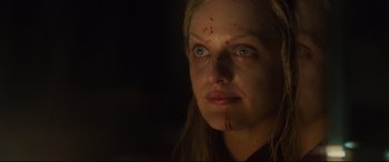 Movie still from “Us” (2019), directed by Jordan Peele – A person with blood all over her face; Close Up shot, Over the shoulder angle