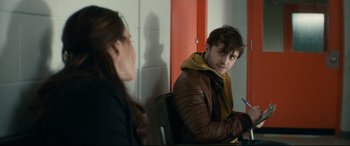 Movie still from “Horns” (2013), directed by Alexandre Aja – A man and a woman are sitting at a table; Medium shot, Over the shoulder angle