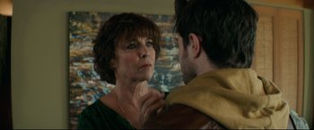 Movie still from “Horns” (2013), directed by Alexandre Aja – A woman and a young man are looking at one another; Close Up shot, Over the shoulder angle
