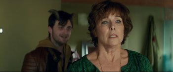 Movie still from “Horns” (2013), directed by Alexandre Aja – An older woman and a younger man in a room; Close Up shot, Over the shoulder angle