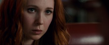 Movie still from “Horns” (2013), directed by Alexandre Aja – A person with long red hair; Close Up shot, Over the shoulder angle