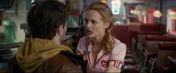 Movie still from “Horns” (2013), directed by Alexandre Aja – A woman talking to a man at a restaurant; Close Up shot, Over the shoulder angle