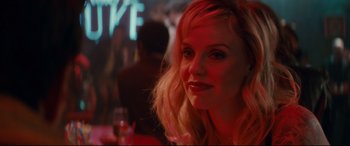 Movie still from “Horns” (2013), directed by Alexandre Aja – A person sitting at a table; Close Up shot, Over the shoulder angle