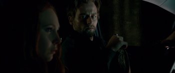 Movie still from “Horns” (2013), directed by Alexandre Aja – A person holding a cell phone; Close Up shot, Over the shoulder angle