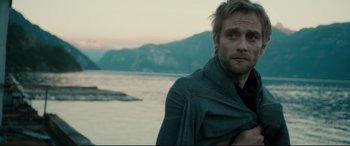 Movie still from “Horns” (2013), directed by Alexandre Aja – A person near a body of water; Close Up shot, Over the shoulder angle