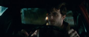 Movie still from “Horns” (2013), directed by Alexandre Aja – A person in a car; Close Up shot, Over the shoulder angle