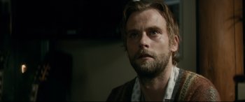 Movie still from “Horns” (2013), directed by Alexandre Aja – A person with a beard; Close Up shot, Over the shoulder angle