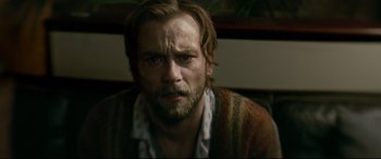 Movie still from “Horns” (2013), directed by Alexandre Aja – A person with a beard; Close Up shot, High angle