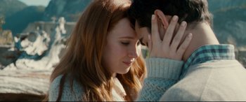 Movie still from “Horns” (2013), directed by Alexandre Aja – A young man and a young woman sitting next to each other; Close Up shot, Over the shoulder angle