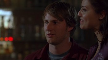 Movie still from “Hostel” (2005), directed by Eli Roth – A man and a woman looking at each other; Close Up shot, Over the shoulder angle