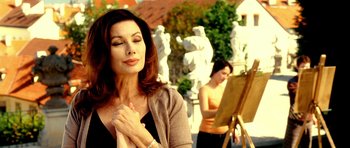 Movie still from “Hostel: Part II” (2007), directed by Eli Roth – A woman with her hands clasped in front of her face; Close Up shot, Low angle