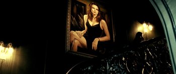 Movie still from “Hostel: Part II” (2007), directed by Eli Roth – A painting of a woman in a black dress; Medium shot, Low angle