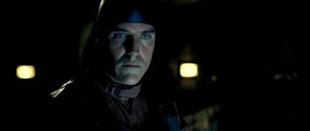 Movie still from “Hostel: Part II” (2007), directed by Eli Roth – A person wearing a helmet; Close Up shot, Low angle