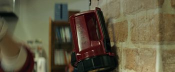Movie still from “Hotel Royal” (2020), directed by Masaharu Take – A red lantern hanging on the wall; Close Up shot, Low angle