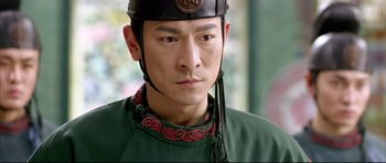 Movie still from “House of Flying Daggers” (2004), directed by Yimou Zhang – A person wearing a helmet; Close Up shot, Low angle